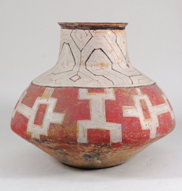 Large Pre-Columbian Vessel: Large Pre-Columbian earthenware water vessel, extraordinary condition for age (600 a.d.) thin line geometric design on top third, 2 chips on rim, bottom two-thirds has alternating large geometric desi