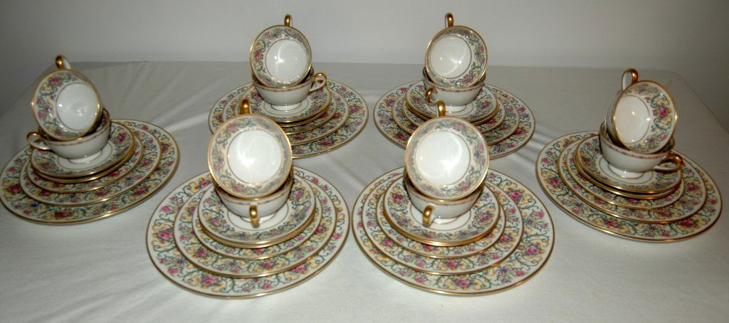 Charles Ahrenfeldt, Limoges China: Charles Ahrendeldt, Limoges china, service for 6, 7 piece per setting. DP, SP, BBP, Bul & S. tea cup and saucer each. Beautiful border of hand painted raised enamel floral, reverse bears mark of Phila