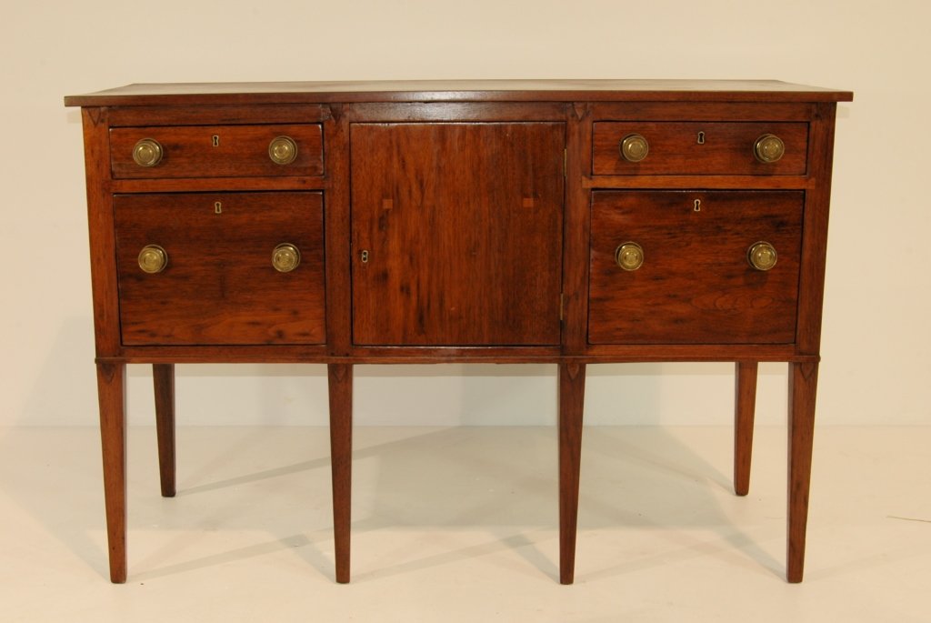 American North Carolina Sideboard: Period American North Carolina sideboard, c 1825-1850, in walnut with pine and poplar secondary woods. Working locks, probably original hardware, tapered legs, some minor restoration, good condition. 