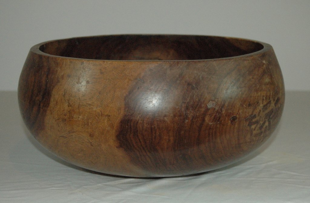 Hawaiian Poi Bowl: Hawaiian Poi bowl (calabash), fine Koa wood example, late 18th early 19th century. Indigenous repairs, great patina and size. 13.5" diameter, 6.5"H.