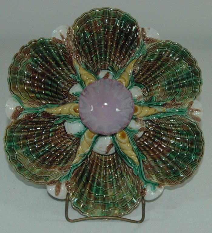 George Jones Majolica Oyster Plate: George Jones, England, Majolica shell oyster plate, 10.5", center cup has professional restoration, otherwise good condition, signed.