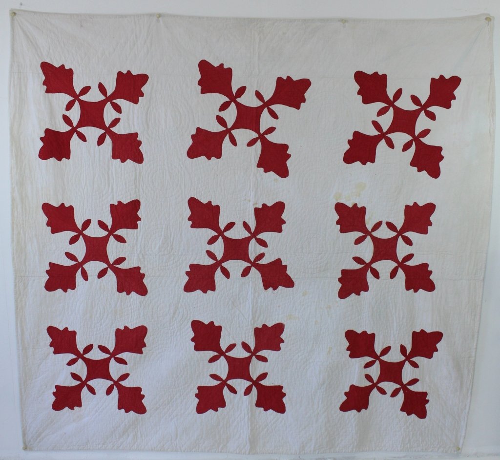 Red and White Applique Quilt: Hand sewn red and white "Oak Leaves" applique quilt, cotton seed batting, c. 1900. 76" x 71", fair condition with minor stains. From the Deborah Apple collection, #902.