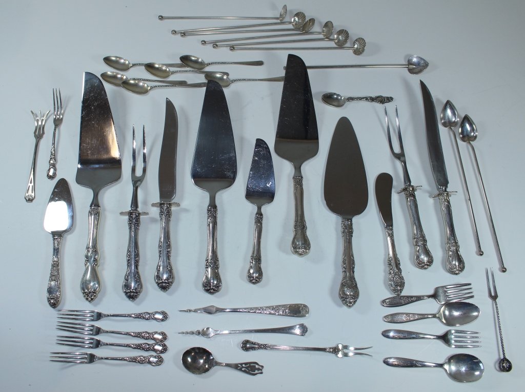 Large Group of Sterling Silver: Large group of sterling silver serving pieces (39): 2 carving sets, 6 slice servers, 2 olive spears, 1-2 pc child's sets, 8 long stirrers, 3 hors d'oeuvre forks, 6 demitasse spoons, master butter knif