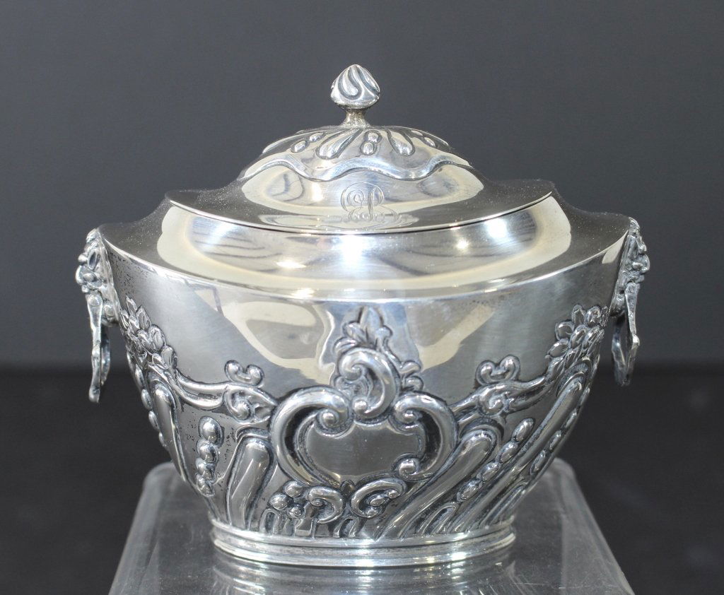Charles Stuart Harris, English Sterling Tea Caddy: Charles Stuart Harris, English sterling tea caddy, c. 1892, excellent condition, monogrammed tilt lid, embossed decoration, 6.18 ozt.