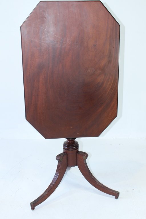 Duncan Phyfe Style Tilt Top: Duncan Phyfe style tilt-top candle stand in mahogany, single board oversize top with cut corners, acanthus carved pedestal, reeded tripod legs, probably a Centennial example c. 1876, good condition, 2