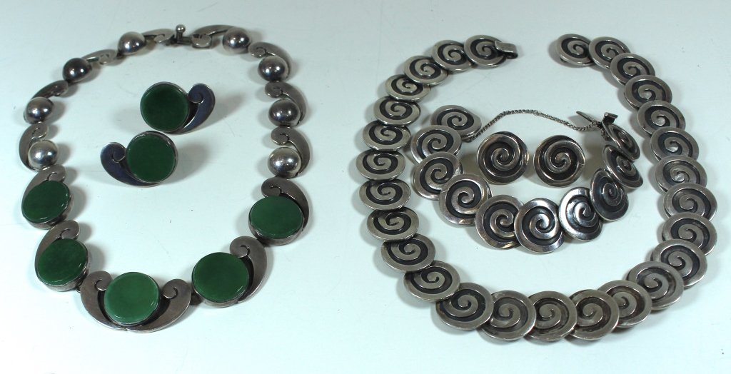 Mexican Sterling Silver Group: Mexican sterling silver group; Los Castillo necklace 16" x .75", bracelet 6.5" x .75", matching earrings set. Also Pitino necklace 16" x .75", earrings set with green stones, signed Taxco sterling, go