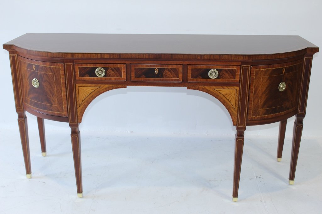 Hepplewhite Inlaid Sideboard by Baker: Fine Hepplewhite style inlaid sideboard by Baker Furniture, copy of original from 1810, parquetry string inlay, fan inlay, banded top, 3 small drawers, 2 side cabinets, excellent condition. 36" x 72" 