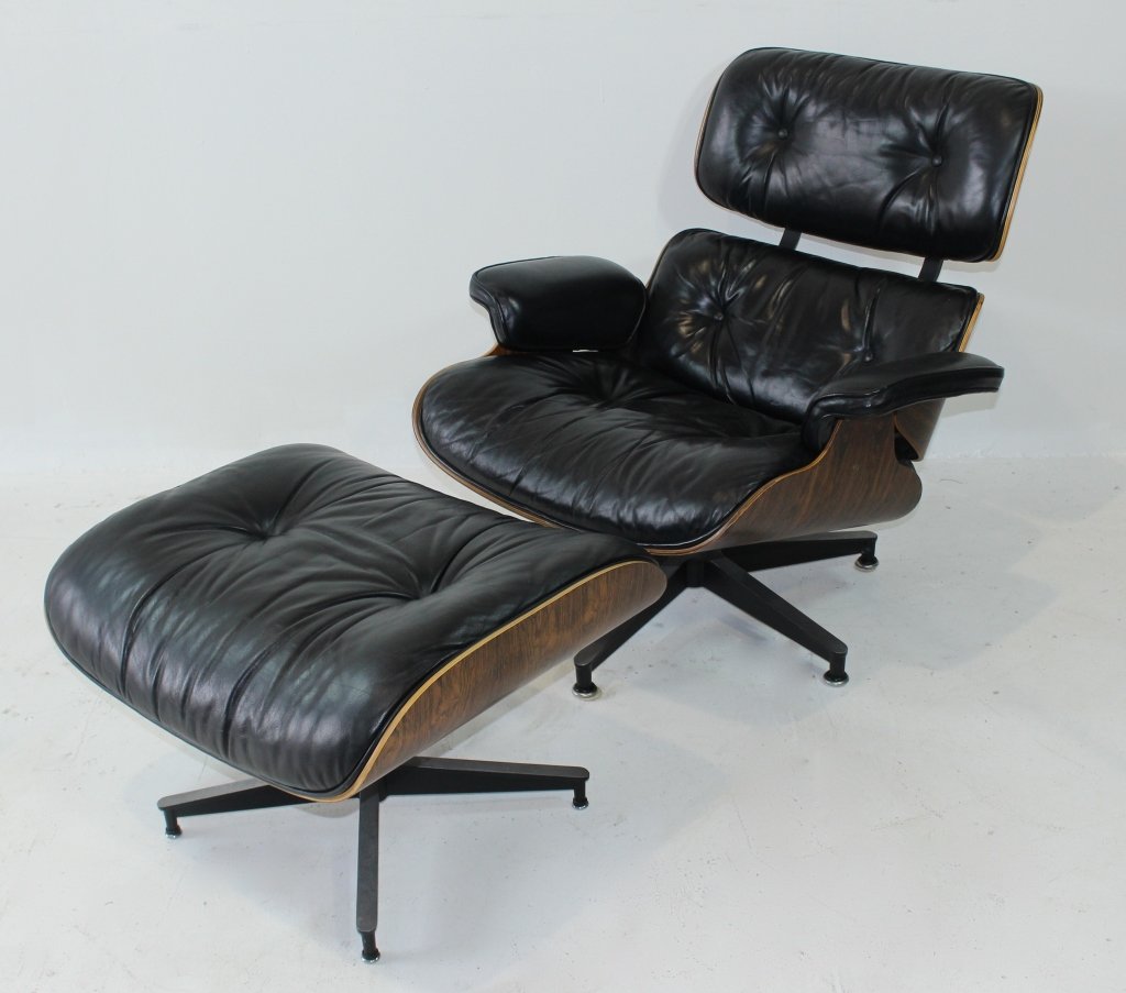 Charles & Ray Eames Lounge Chair & Ottoman: Charles & Ray Eames lounge chair & ottoman, by Herman Miller, dated 1982, rosewood laminated frame, black leather, excellent condition, all labels intact. Correction on maker: Herman Miller, not Knoll