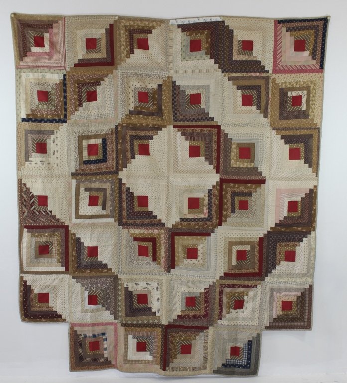Rare Log Cabin Patchwork Quilt, c. 1860: Rare "Log Cabin" patchwork quilt, c. 1860, with a "Barn Raising" variation, cut-outs for poster bed, 77" x 64", in exceptional condition, 2 tiny stains and one small frayed area. From the Deborah Appl