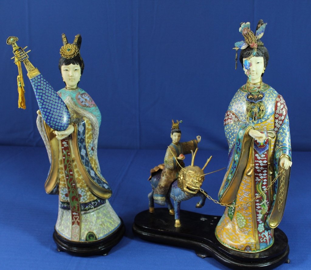 Two Chinese Cloisonne Enamel and Ivory Figures: Two Chinese cloisonne enamel and ivory figures, both with ivory faces and hands, very detailed female with boy riding qilin and lady musician with lute, both in good condition. 16" tallest. Note: this