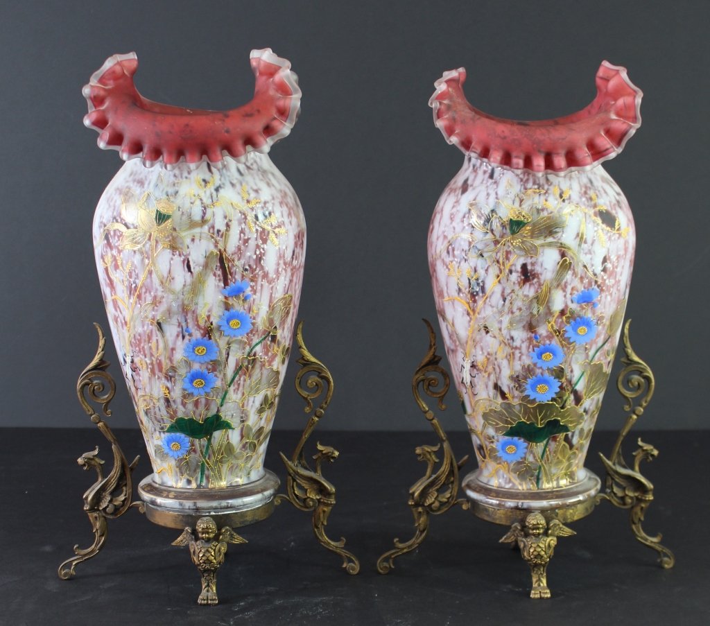 Pair of Harrach Ormolu Mounted Vases: Pair of Bohemian Harrach ormolu mounted vases, gilded raised enamel flora and fauna decoration on multi-colored glass with ruffled top and cranberry interior, polished pontail, numbered, beautiful con
