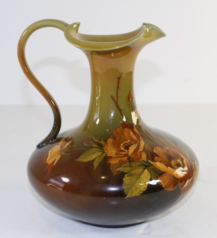 Rookwood Pottery Ewer by Matthew Daly: Rookwood Pottery ewer by Matthew Daly, standard glaze with beautiful floral decoration, dated 1891, shape 495A, "S" for special white clay body, 10"h, 9" diameter, mint condition.