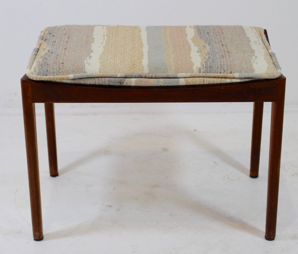 Jens Risom Ottoman: Jens Risom ottoman, solid walnut, arched aprons, upholstered in original fabric, good condition, 18"h, 24"w, 15"d.