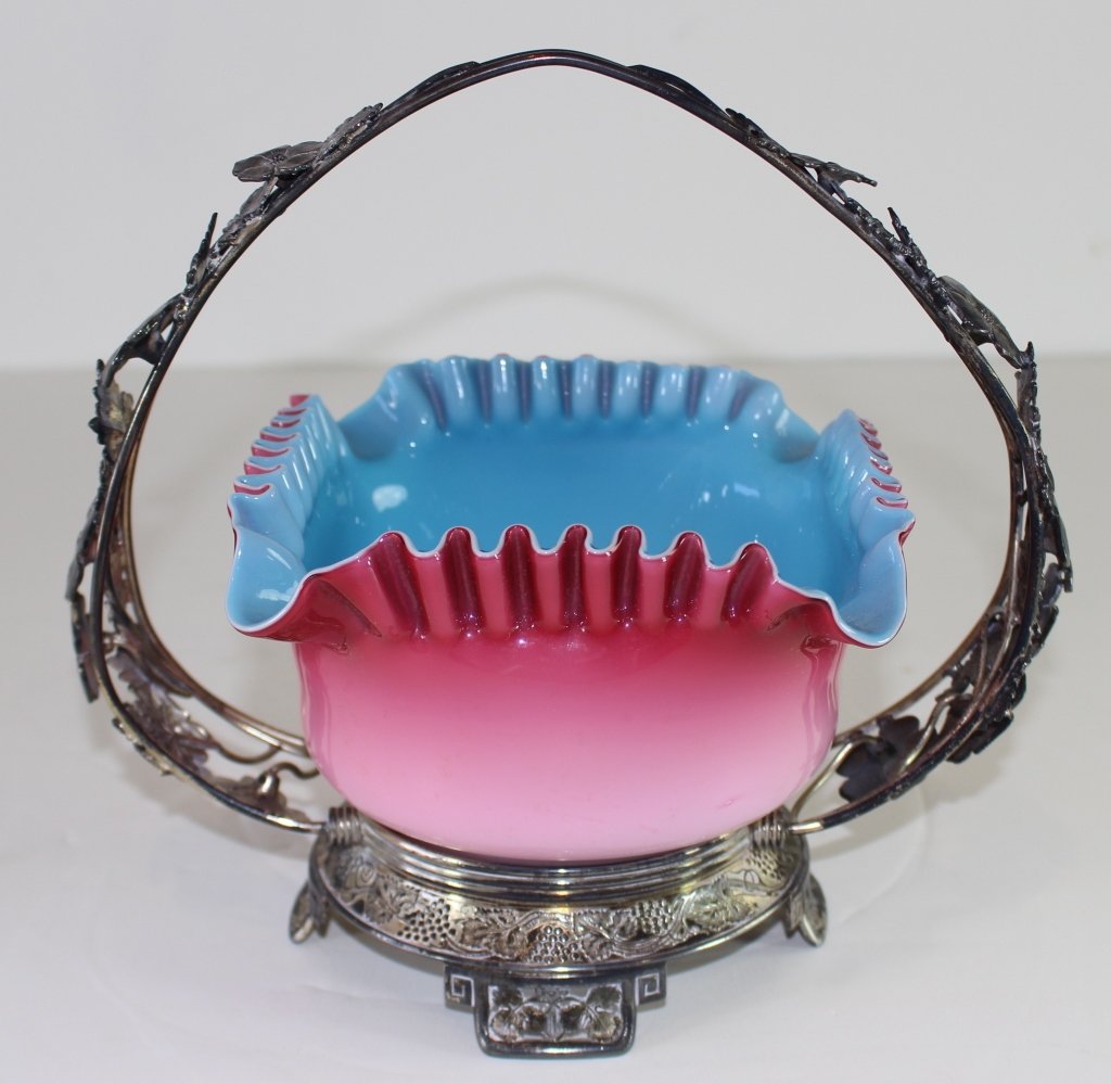 Pairpoint Bride's Basket: Pairpoint bride's basket with glossy Peach Blow glass bowl, blue interior, frame is ornate quadruple plate. Both pieces good condition. 9.5" x 10".