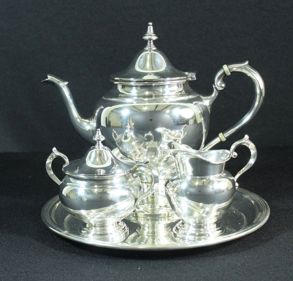 Gorham 4 Piece Sterling Tea Set: Gorham 4 piece sterling silver tea set with matching 10" tray. Tea pot is 2.5 pints, 39.10 ozt. Good condition.