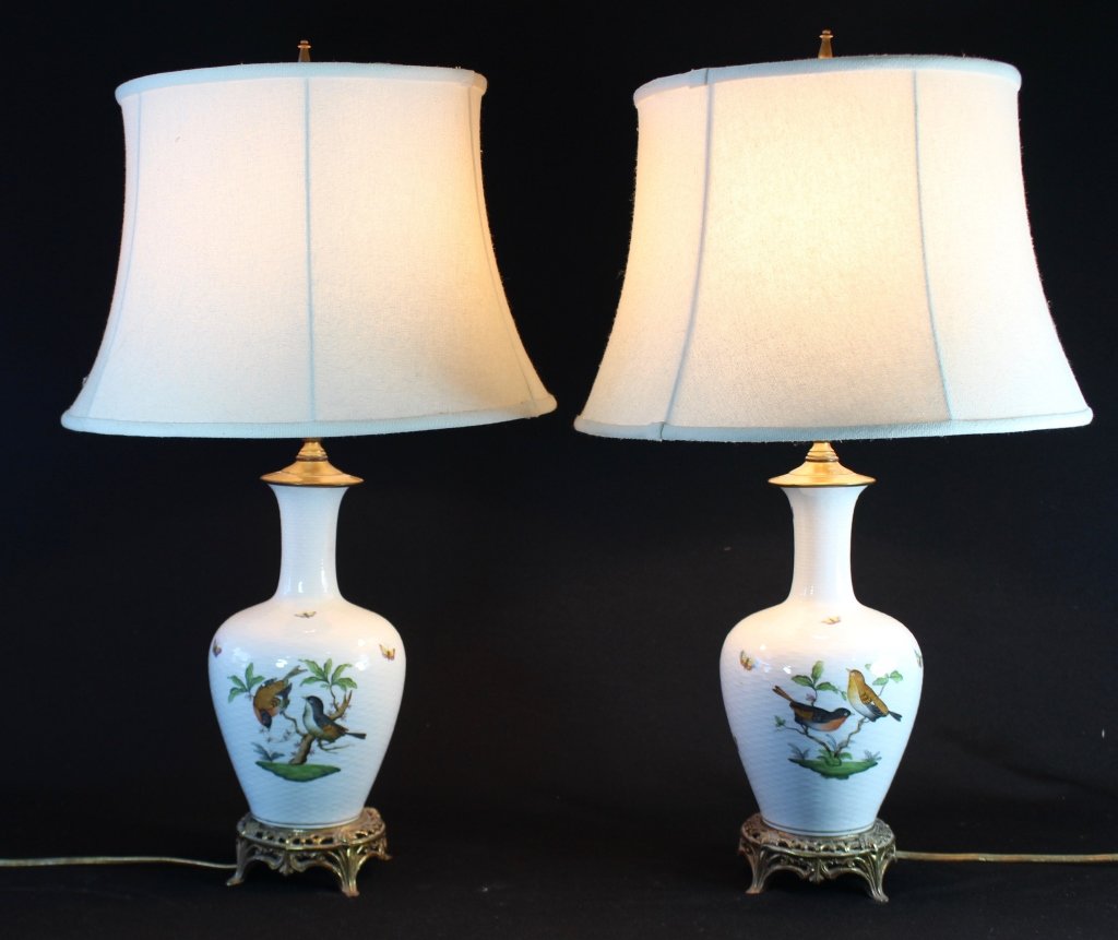 Pair of Herend Porcelain Table Lamps: Pair of Herend porcelain table lamps, "Rothschild Birds", factory made, 12.5" from pierced metal base to top of narrow neck, 26.5" overall, silk shades, good condition.