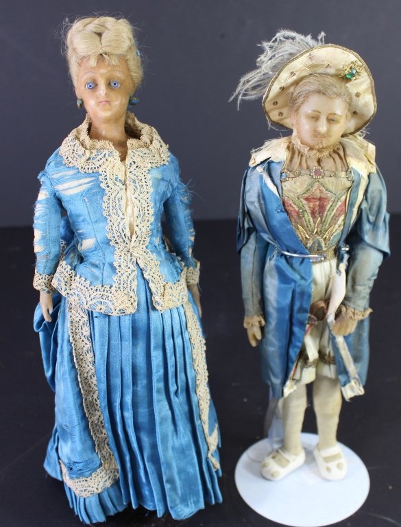 Two Mid 1800s Wax Dolls: Two mid 1800s wax dolls, one French fashion doll, c 1860 and rare adult male doll, clothes appear to be original, good condition considering age, each approximately 14" tall.