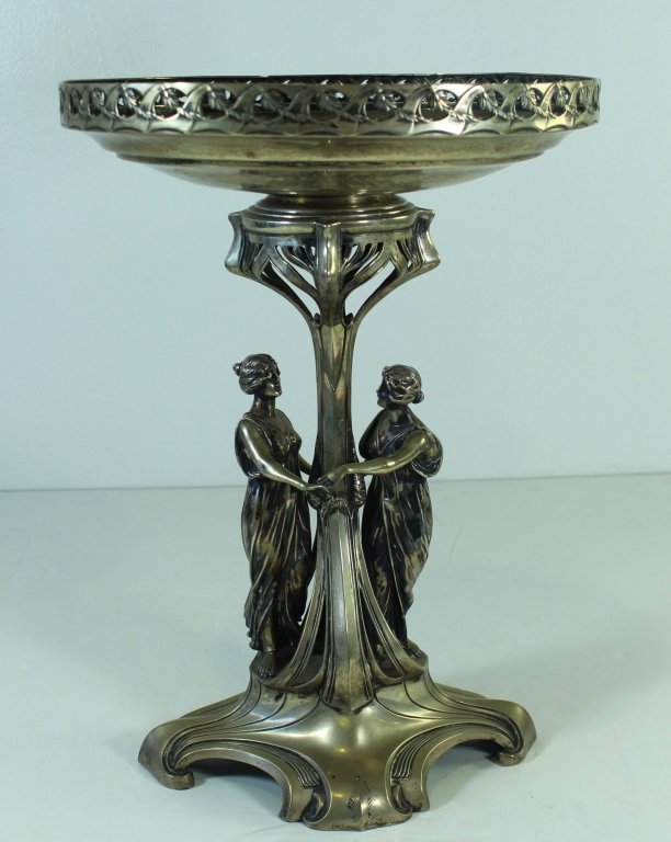 Austrian .800 Silver Art Nouveau Compote: Austrian .800 silver Art Nouveau compote, figural dancing girls on flowing organic pedestal, 12.5" diameter, 17.5" tall, hallmarked. Good condition, missing interior insert bowl. 76.8 ozt.