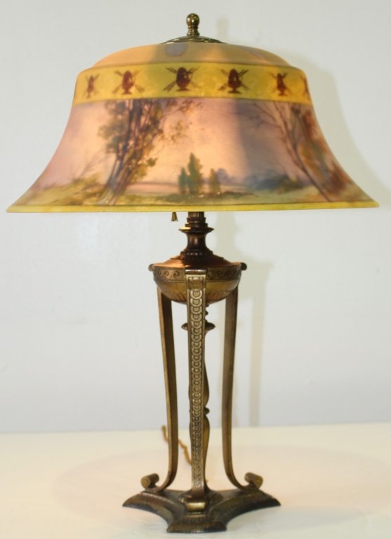 Pairpoint Reverse Painted Table Lamp: Pairpoint scenic reverse painted table lamp. Fine landscape scene with border of windmills, open metal base, signed, original wiring, 16.5" diameter shade, 22.5" tall. Very good condition.