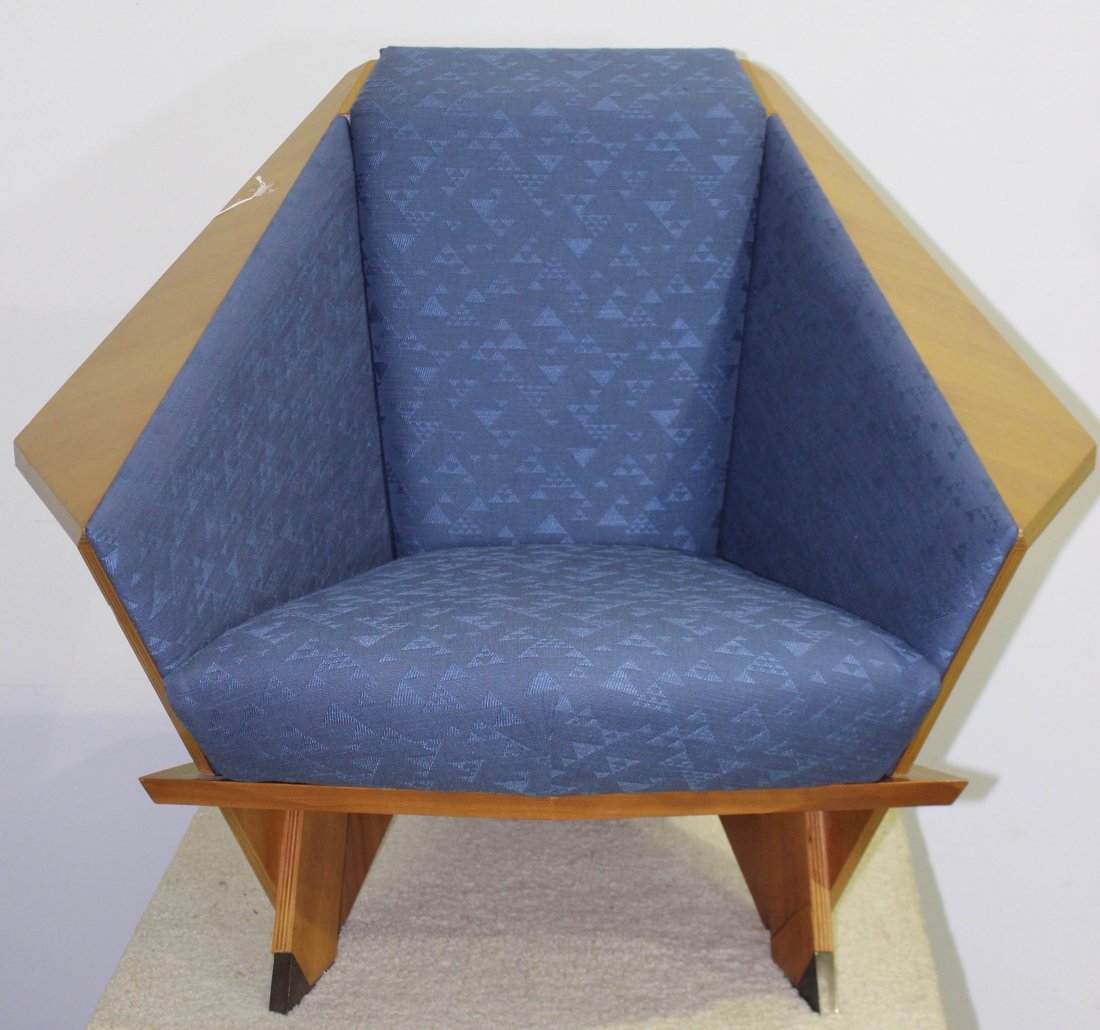 Frank Lloyd Wright Designed Armchair: Frank Lloyd Wright designed for "Taliesin" armchair by Cassina, Italy, c. 1986. Laminated birch in geometric shape. Upholstered in FLW fabric by Schumacher. Bronze cap feet, old repair to right foot l