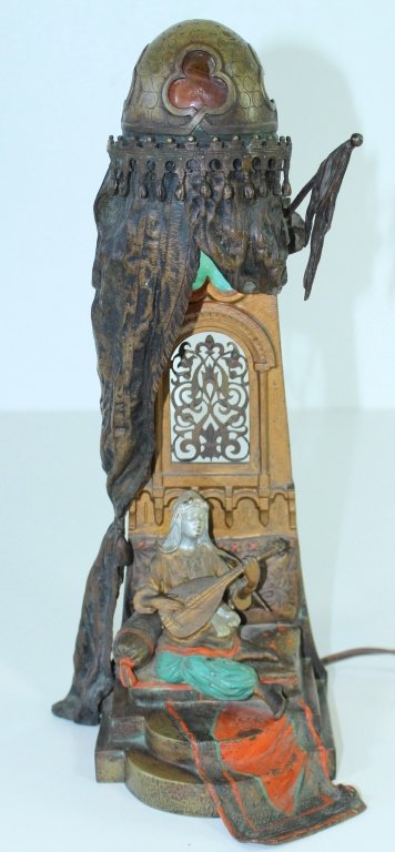 Bergman Cold Painted Bronze Lamp: Austrian cold painted bronze lamp, figure playing string instrument on steps under draped dome. Signed Franz Bergman, Gesch in verso. Missing star and crescent finial, face repainted. 13.5" tall.