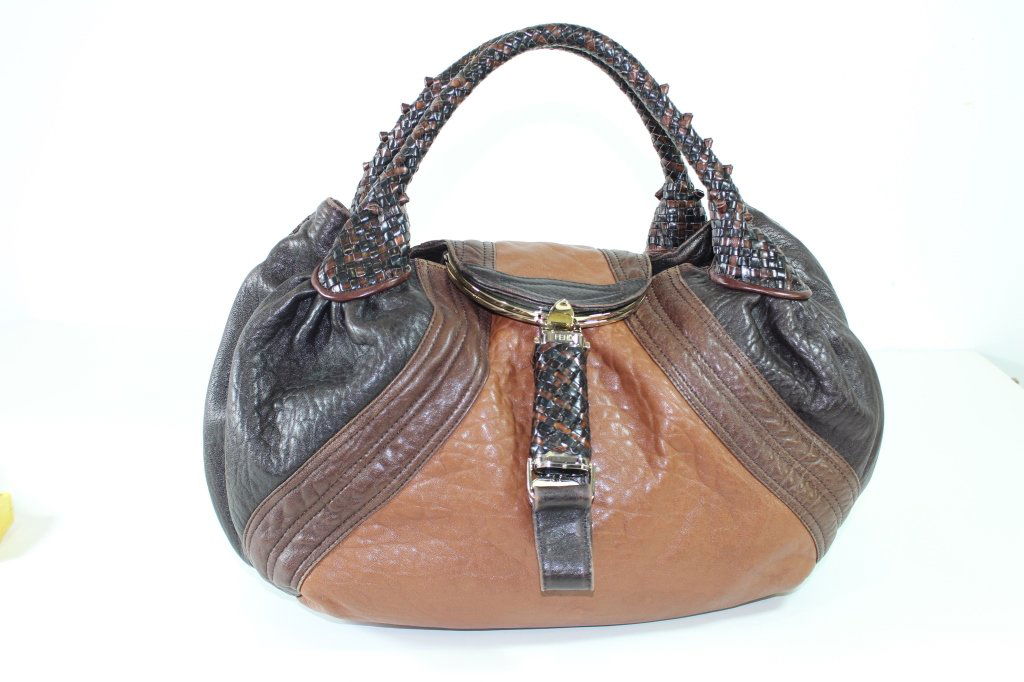 Fendi Leather Tribal Spy Bag: Fendi multi-toned leather handbag, Spy Bag handle, braided leather handles, "Spy Bag", unique interior snap compartment on overlap strap for phone, etc. Fendi monogram fabric on interior phone pocket.