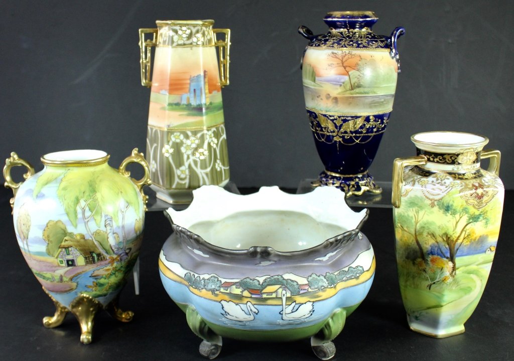 Five Piece Group of Nippon: Five piece group of scenic Nippon porcelain, 1890-1921, this group features vases 7" -8.25" and footed 9" x 5" bowl (factory flake on edge, shown), some minor wear to gold.