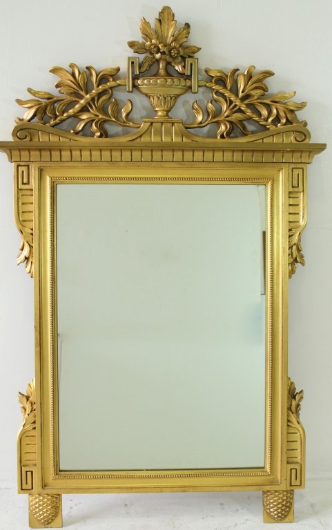 Karges Furniture Formal Gold Leaf Mirror: Karges Furniture company formal gold leaf mirror, made is USA, all carved wood frame, top finial has no-see professional repair, 59" x 38", signed.