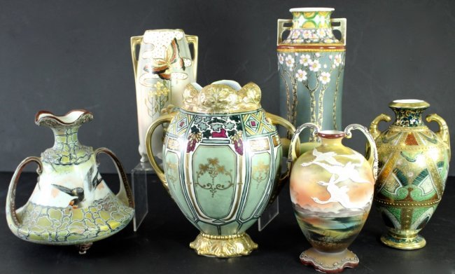 Six Piece Group of Nippon: Six piece group of Nippon porcelain, 1890-1921, this group features 2 - 8" moriage raised design vases, 10" vase with dogwood trees, 8.5" butterfly vase, 2 heavy gold and colorfully decorated vases 9.