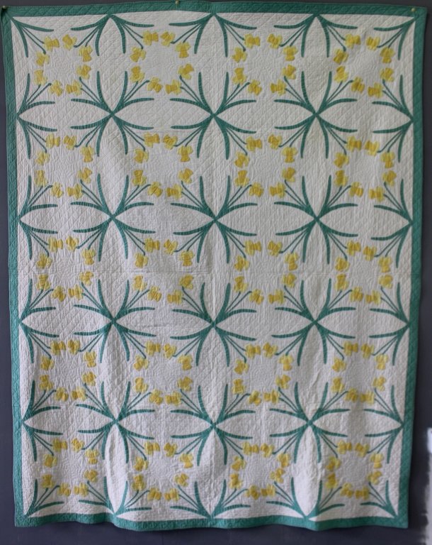 1930s Applique Quilt: 1930s hand sewn applique quilt, "Buttercup" design, 69" x 86", well made and good condition.