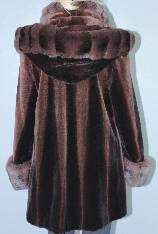 Fine Sheared Mink Stroller with Hood: Fine sheared dark brown mink stroller with detachable hood, by Fantasia Furs, Beaver Creek, Co. 36" length from shoulder, 26" sleeve with rolled cuff, immaculate condition and style.