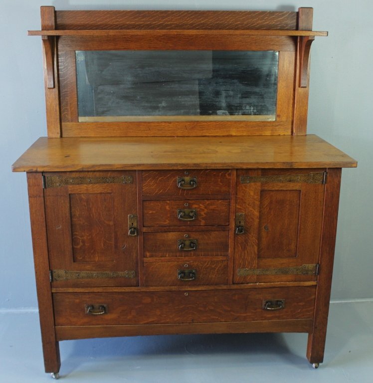 L. & J. G. Stickley Sideboard #737: L. & J. G. Stickley oak sideboard, #737, mirrored back, hammered copper strap hinges and hardware, 4 drawers over long bottom drawer, key lock side doors, good original finish, some staining to top, l