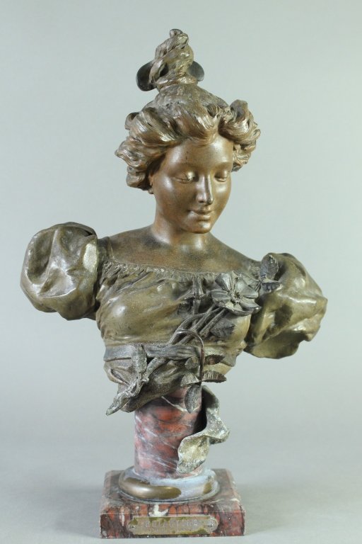 Art Nouveau Lady "Eglantine" Bust: Art Nouveau lady "Eglantine" bust by H. St. Lerche, lightly polychrome spelter on red marble pedestal, labeled in front, 16" x 10" good condition, with some minor pitting, flake on one plinth edge.