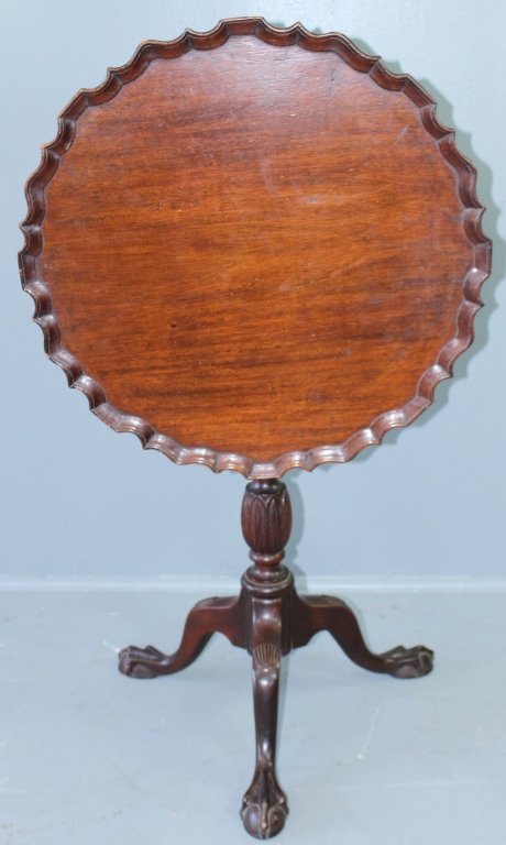 Mahogany Tilt-top Table, c. 1790-1800: Mahogany piecrust tilt-top table, single board top, talon on egg feet, shell carved knees, carved tobacco leaf post, good working order, c. 1780-1800, 28.75" high, 24" diameter top, 42" upright.