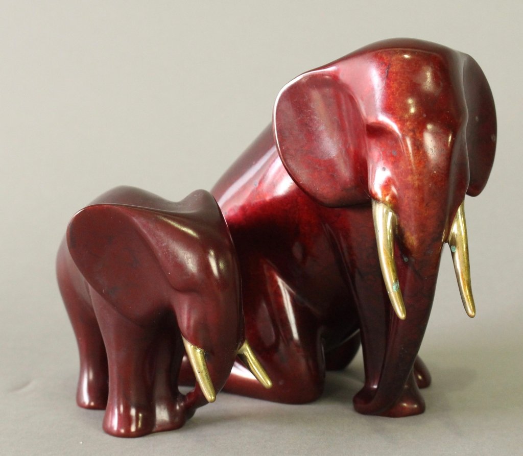 Two Loet Vanderveen Bronzes Elephants: Two signed Loet (Vanderveen), South African, polychrome limited edition 380/750 kneeling elephant, 6" x 7.5" x 4" and limited edition 1744/2500, 3.75" x 5" x 2" standing baby elephant, both in good co