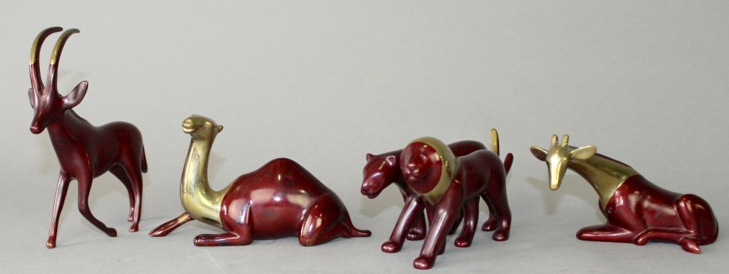 Four Loet Vanderveen Bronze Animals: Four signed Loet (Vanderveen), 1921-2015, South African, polychrome bronze animals: Lion and lioness, limited edition 100/750, 3" x 7" x 2.5", Oryx 54/1750, 6" x 5" x 2", resting giraffe 1423/2500, 3"
