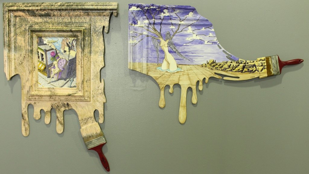 Two Y. B. Martin, Original on Wood: Two Yves B. Martin, originals, unusual cut out plywood, house paint brush and ogee framing of fantasy surrealist subject matter, clever and unique, signed, one is dated 1990, both approximately 23" x 