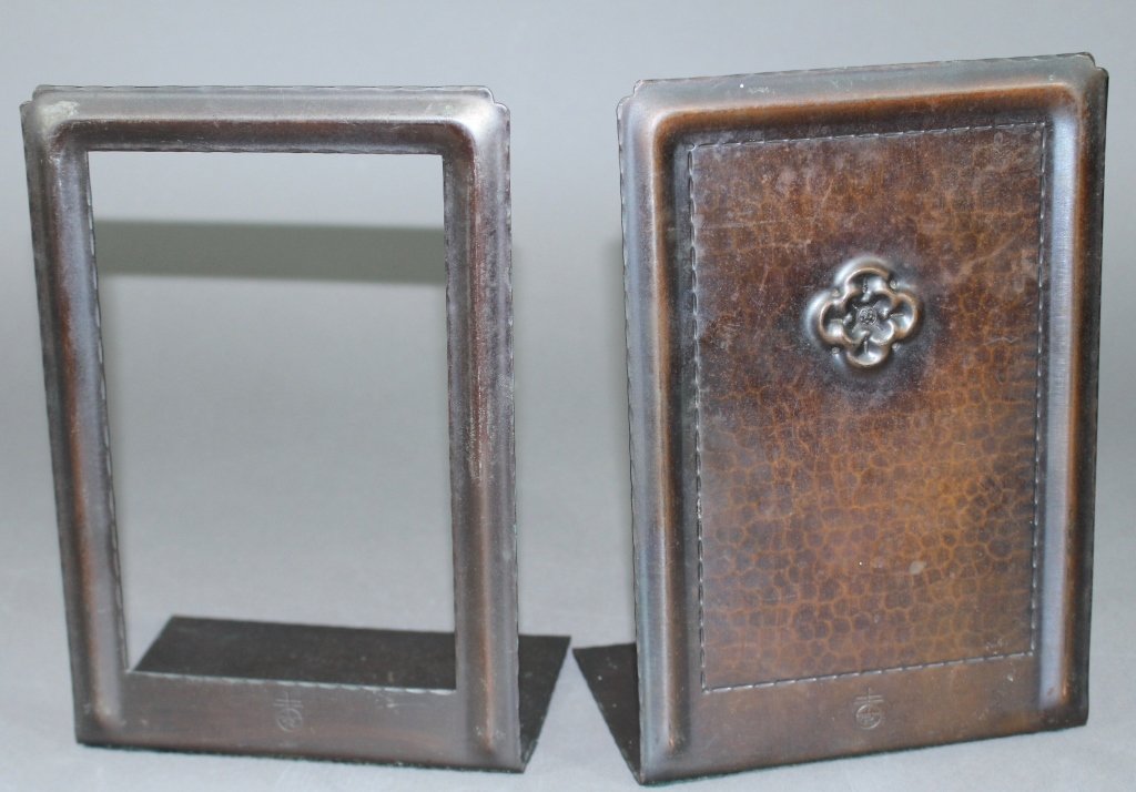 Roycroft Hammered Copper Bookends: Roycroft hammered copper bookends, both marked, these were expressly made for the "Little Journeys" volumes, one is open for showing book cover, excellent original condition. 8.5" x 6" x 3.5".