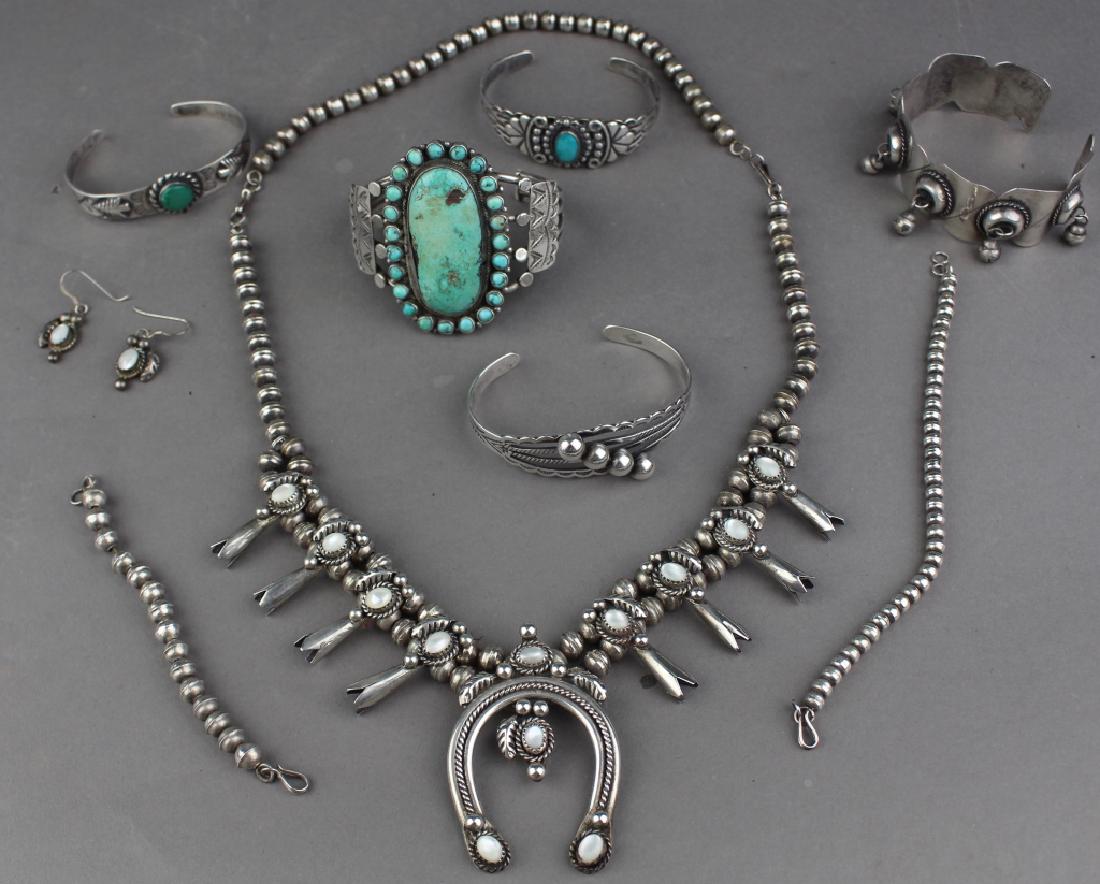 Southwest Native American & Mexican Jewelry Group: Group of Native American silver and turquoise jewelry: 24" squash blossom necklace with moonstones and horseshoe pendant, 7" and 5" beaded bracelets, 3 small bracelets, 2 larger cuff bracelets, pair o