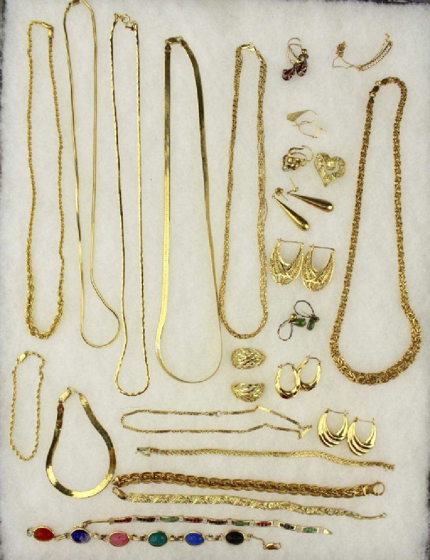 14K Gold Jewelry Grouping: Gold jewelry grouping of twenty five pieces: Six necklaces, 8 bracelets, anklet with diamonds, 9 pairs of earrings, heart pendant, 92.3 dwt.