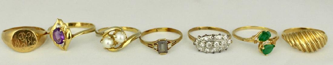 Seven Lady's Karat Gold Fashion Rings: Seven lady's 14K-18K gold fashion rings: 6 are 14K, 1 is 18K. Includes emerald and diamond, diamond cluster, topaz and diamond, amethyst & diamond, pearl, 2 signets, sizes from 6.5 to 9.5. 13.6 dwt.