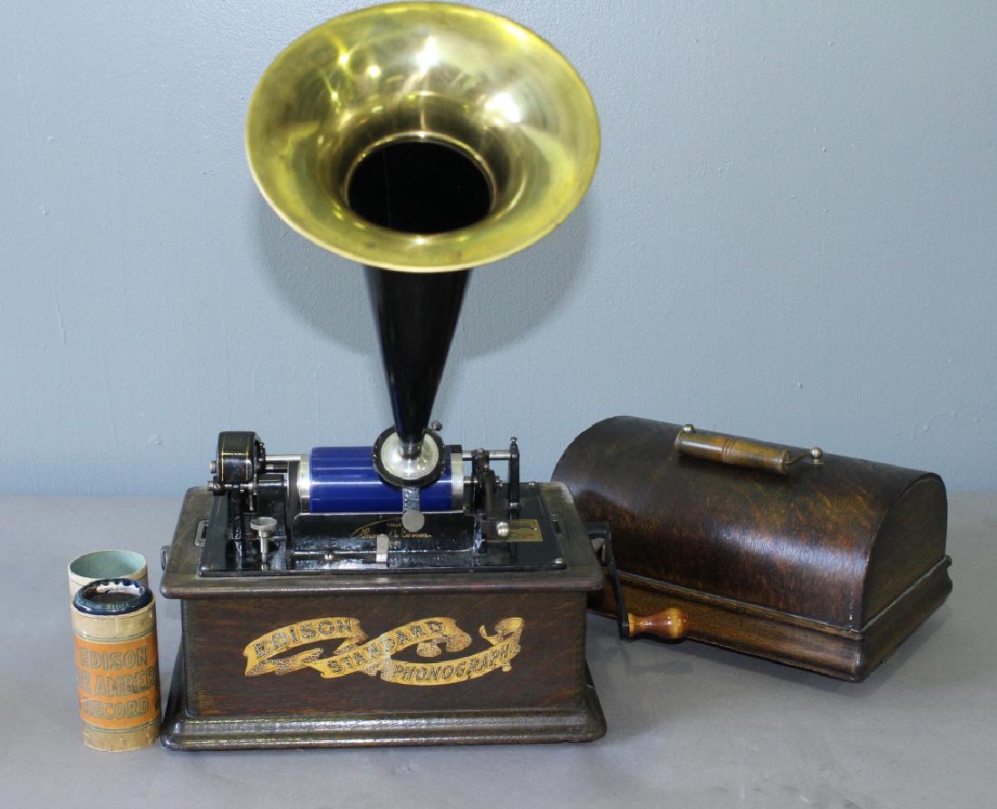 Edison Cylinder Player with Horn: Edison cylinder player with horn very good working condition and sound production. Includes 2 blue Amberole cylinders and 3 empty cases.c