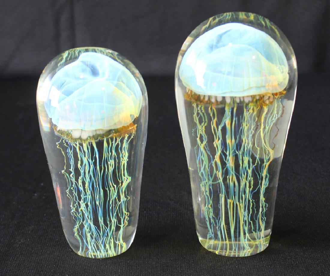 Two Rick Satava Paperweights "Moon" Jellyfish: Two Rick Satava "Moon" jellyfish paperweights. Both in excellent condition, signed, 7" and 6".