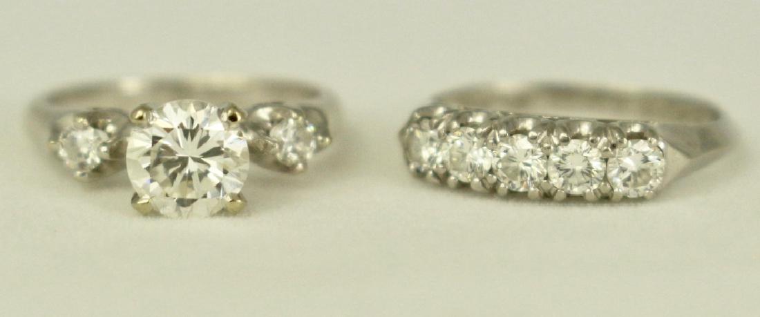 Lady's Wedding Ring Set: Lady's wedding ring set: wedding band in platinum with 5 full round cut melee diamonds with approximate weight .75 ctw, size 3.5, with a 14K white gold and diamond engagement ring in Tiffany style set