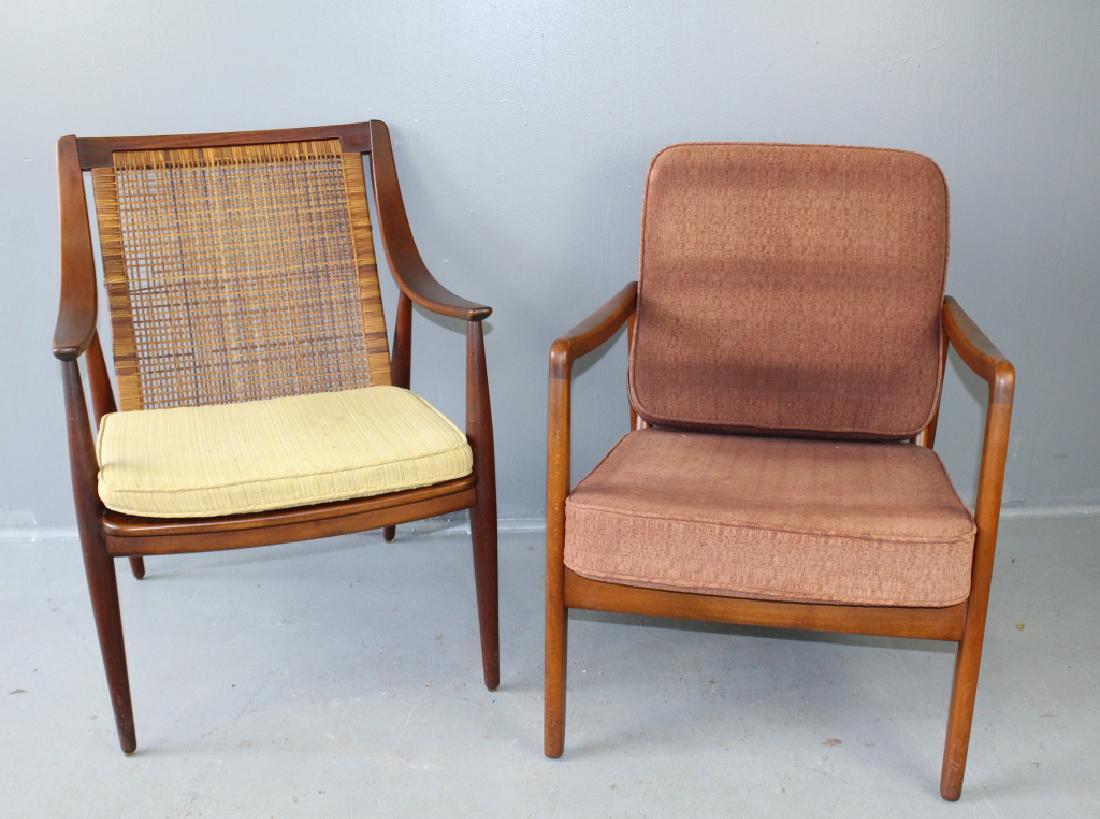 France & Daverkosen Arm Chairs: Two France & Daverkosen mid-century modern teak arm chairs, Danish, makers for John Stuart, New York and Grand Rapids retailers. One with 2 loose cushions 30" x 24" x 25", branded Danish signature and