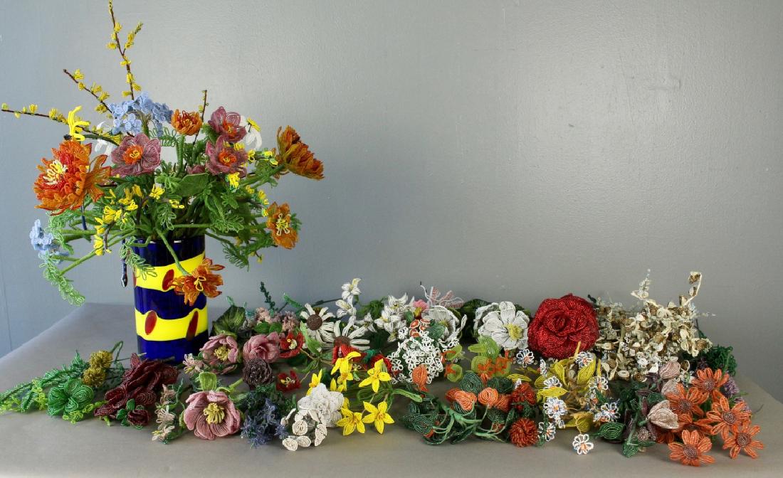 Collection of Handmade Beaded Flowers: Huge collection of handmade beaded flowers. Millions of beads strung by hand on bendable wire stems having infinite arranging possibilities, 80 plus stems with sample arrangement included with vase._x