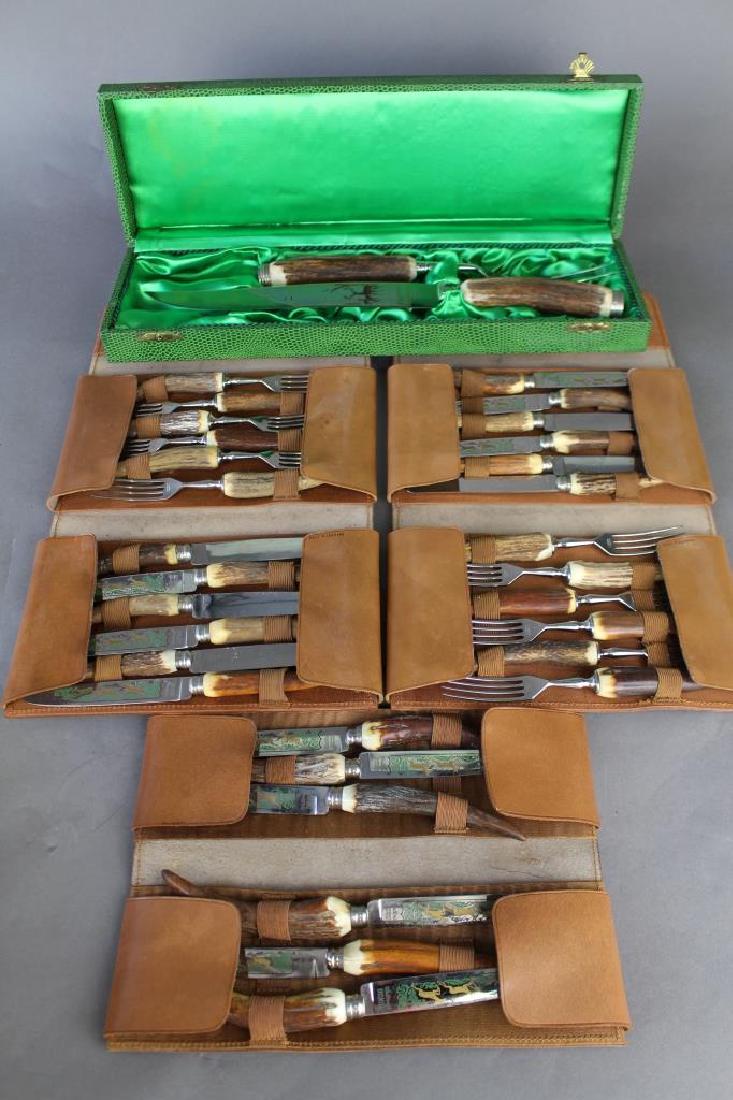 Stag Horn Handle Cutlery and Flatware Set: Stag Horn handle cutlery and flatware set made by Waltcraft, Soligen, West Germany. Set includes 2 piece carving set, 12 steak knives, 12 forks, 6 extra knives, all with scenic engraved and enameled b
