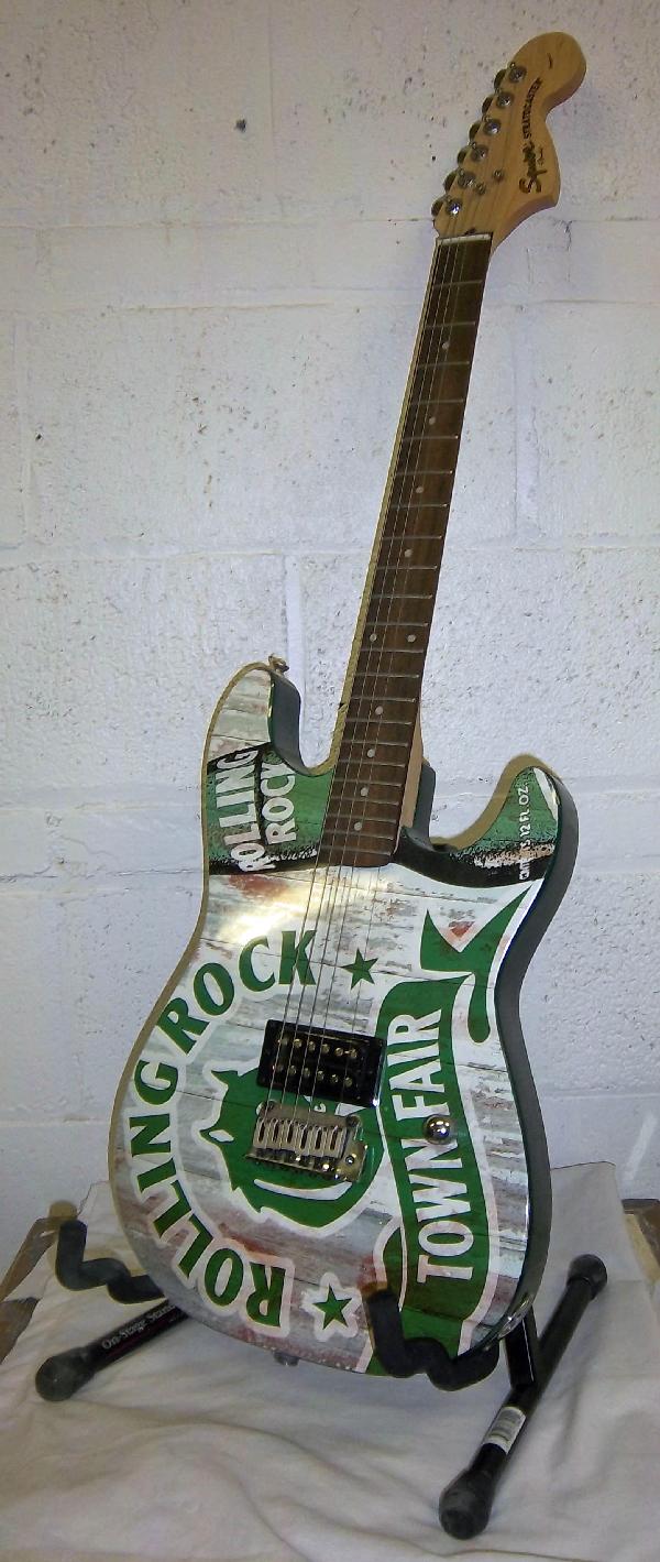 Rolling Rock advertising electric guitar AS IS: Rolling Rock advertising electric guitar by Squier Fender Stratocaster