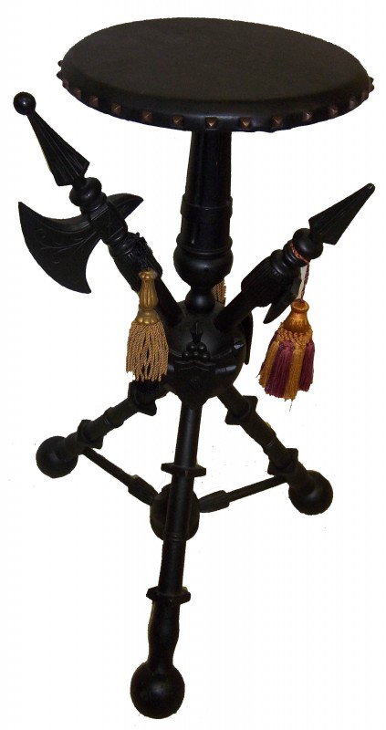 Laquered pedestal w/weapon base 19th C. laquered p: 19th C. laquered pedestal w/mid evil weapons on base 31"hx20"d Auction Estimate $300-600