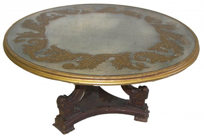 Ca1930 mirrored reverse painted top center table: Ca.1930 mirrored reverse painted top center table with carved base 19"h x 38"diam. Auction Estimate $400-800